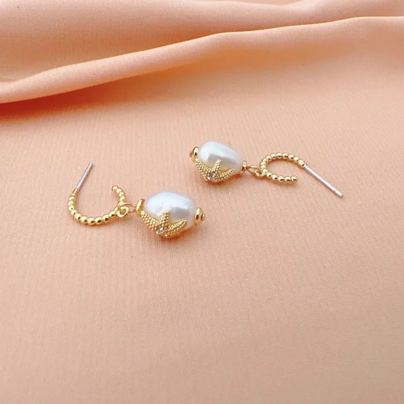 Niche Marine Starfish Pearl Earrings Plated with Real Gold Natural Pearl Inlaid Silver Needle Earrings